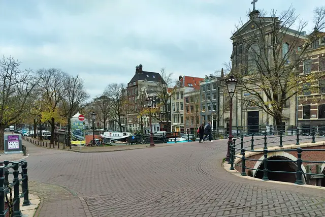 A cobbled bridge over an Amsterdam canal