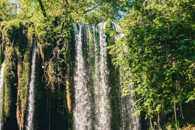 Upper Düden Waterfall falling through dense greenery