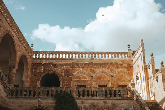 A building with a carved stone façade in Midyat